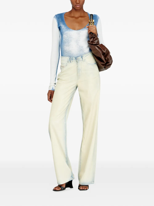 Brown bag carried by a person, showing the bag's fit