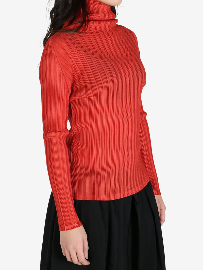 Red shirt worn by a person, side view