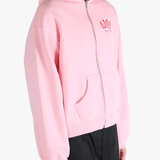 Pink hoodie worn by a person, showing the hoodie's fit