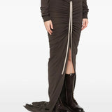 Brown skirts worn by a person, showing the skirts fit