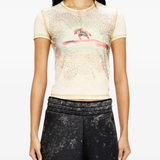 yellow top worn by a person, showing the top fit