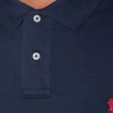 Close up of navy shirts,showing texture of the cotton fabric.