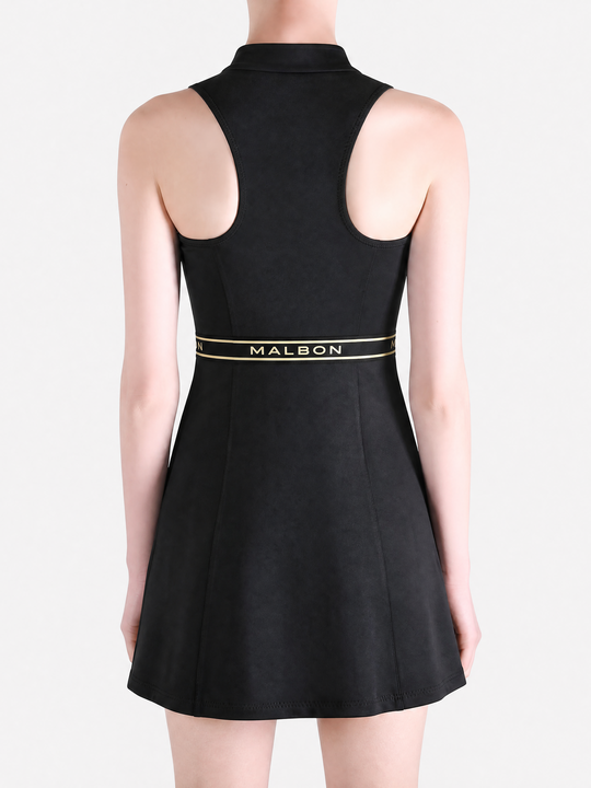 Black dress worn by a person, showing the dress fit