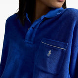 Close up of blue top, showing texture of the cotton fabric