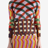 Pink shirts worn by a person, showing the shirts fit