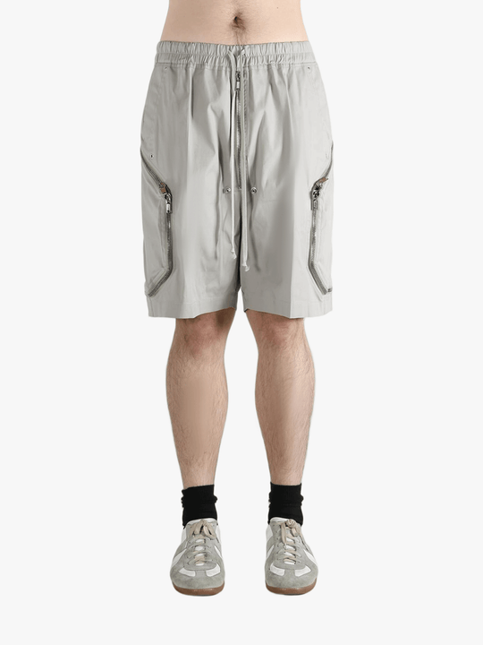 Grey shorts worn by a person, showing the shorts fit
