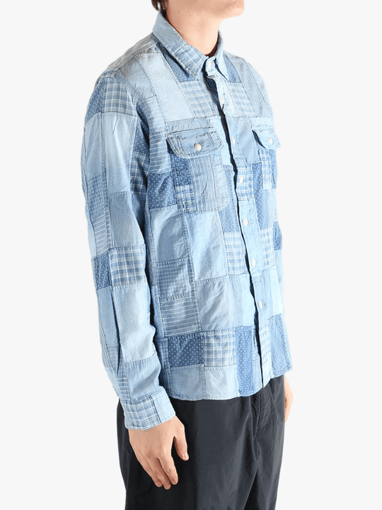 Blue shirt worn by a person, showing the shirt's fit