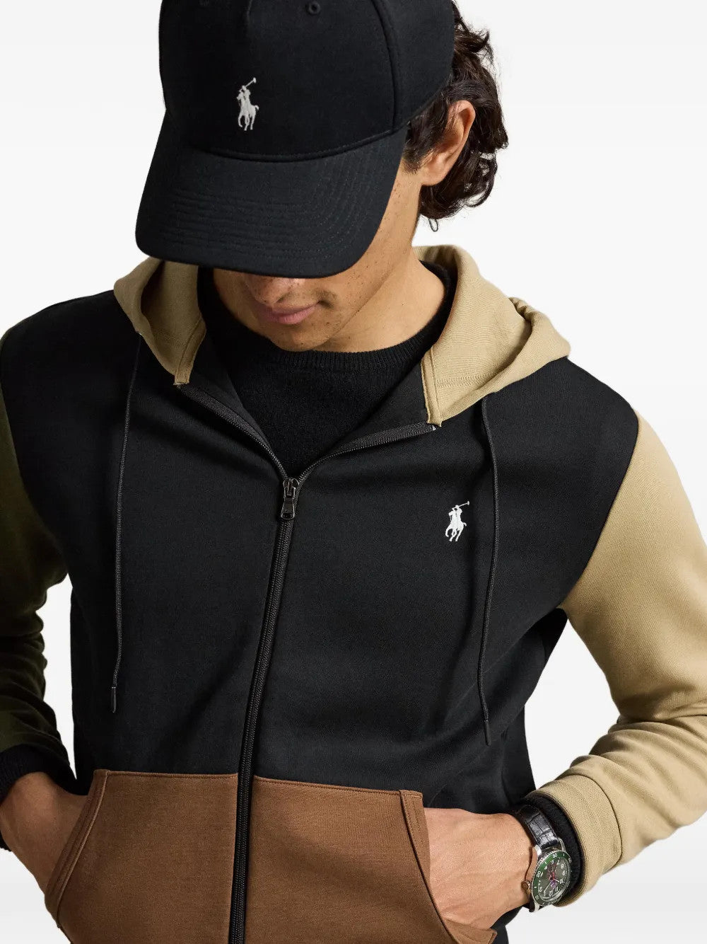 Black hoodie worn by a person, showing the hoodie fit