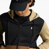 Black hoodie worn by a person, showing the hoodie fit