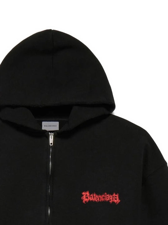 Close up of black hoodies, showing texture of the cotton fabric