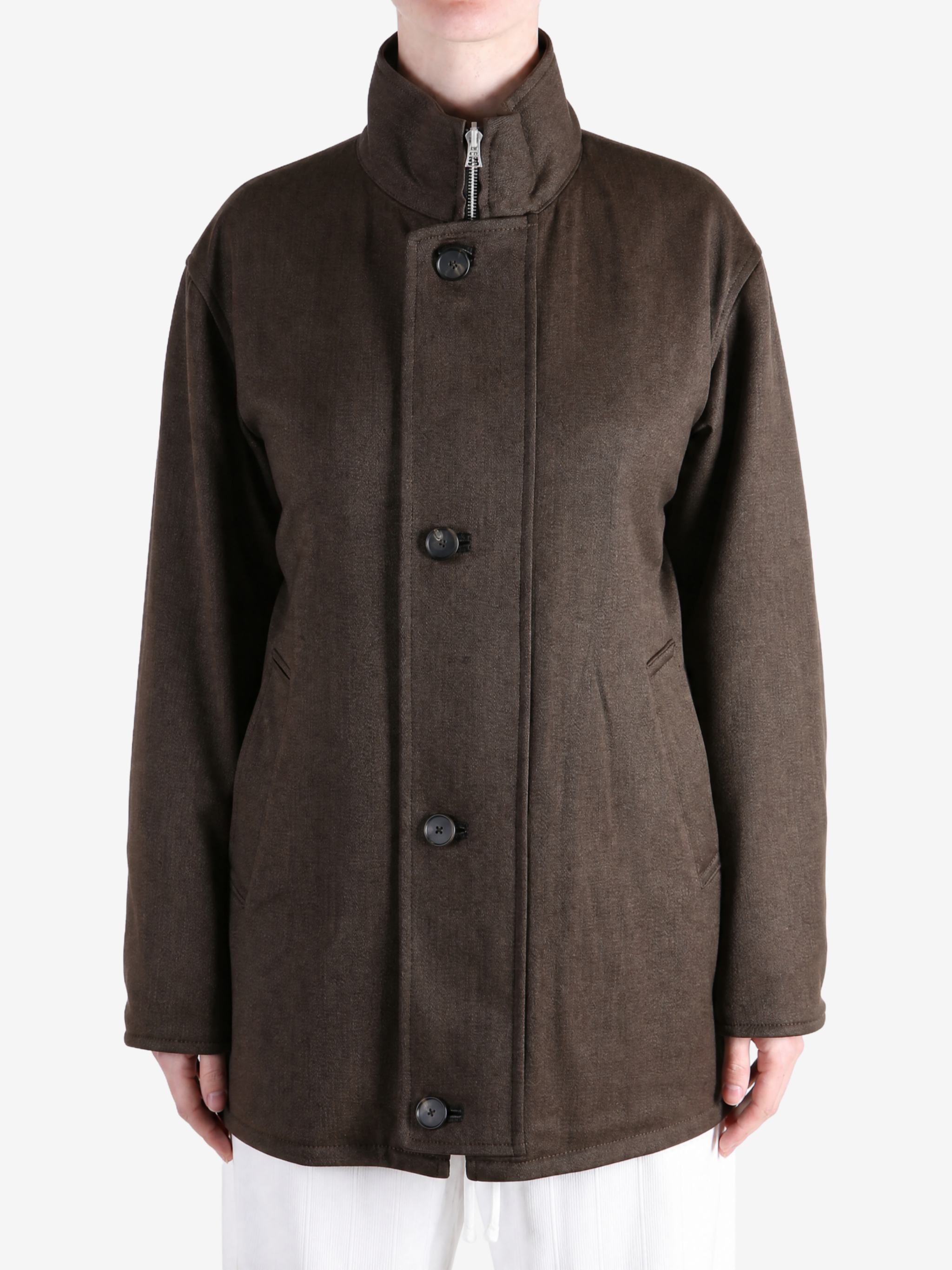 Brown jacket worn by a person, showing the jacket fit