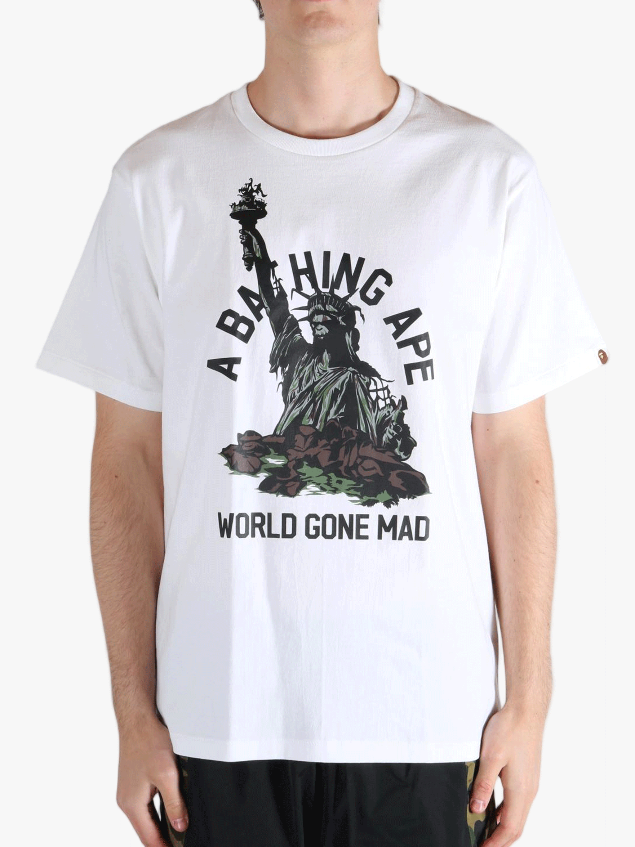 White T-shirt worn by a person, showing the t-shirt's fit