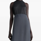 Grey dress worn by a person, showing the dress's fit