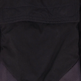 Close up of the black jacket, showing texture of the polyamide fabric