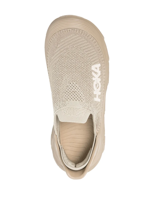 Brown sneakers, vertical view