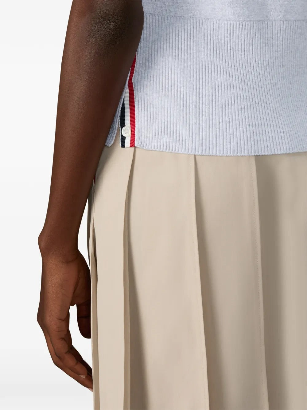 Close up of grey shirts, showing texture of the cotton fabric