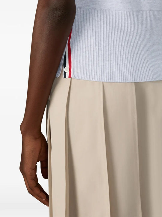 Close up of grey shirts, showing texture of the cotton fabric