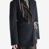 Navy coat worn by a person, showing the coat's fit