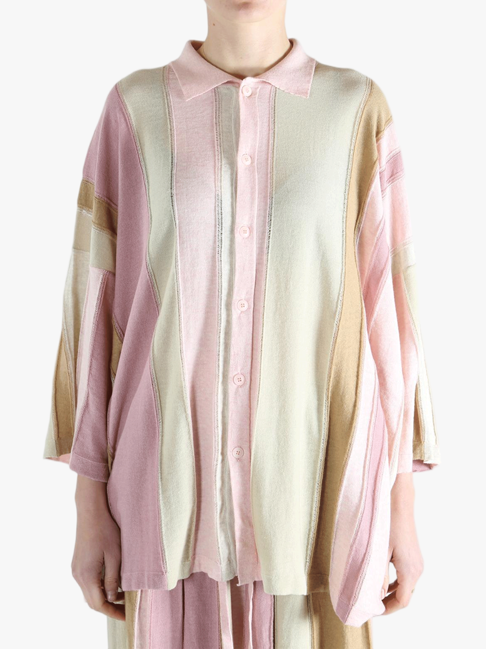 Pink shirt worn by a person, showing the shirt's fit