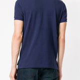 Navy T-shirt worn by a person, showing the shirt's fit