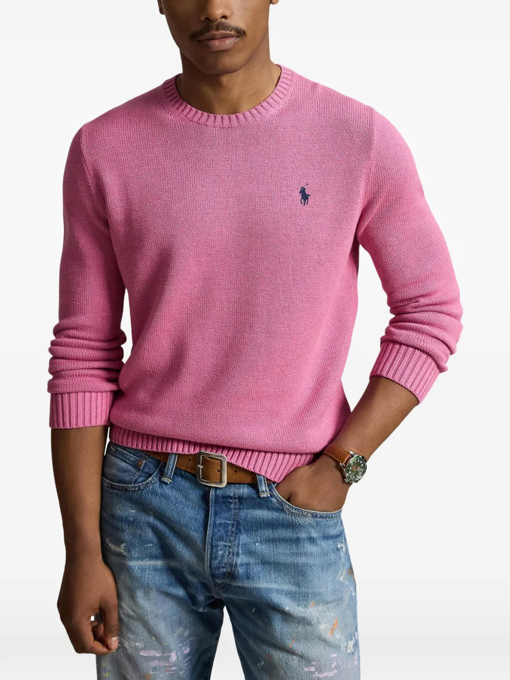 Pink knitwear worn by a person, showing the knitwear fit