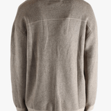 Tan top worn by a person, showing the top fit