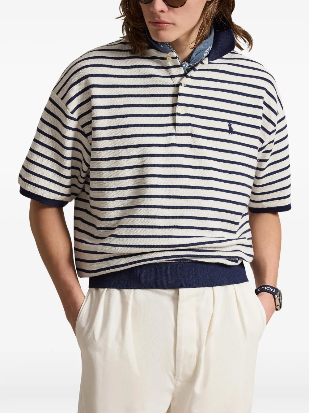 Navy shirt worn by a person, showing the shirt fit