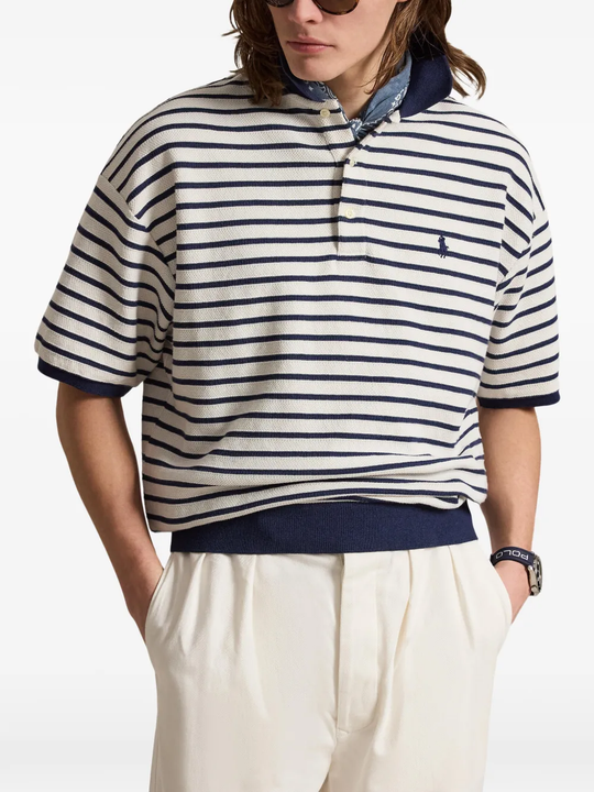 Navy shirt worn by a person, showing the shirt fit