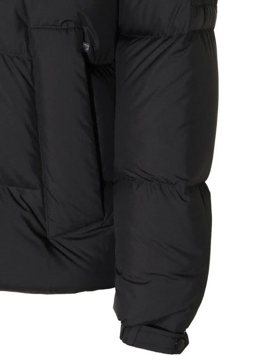 Close up of Black jacket, showing texture of the 100% polyester fabric