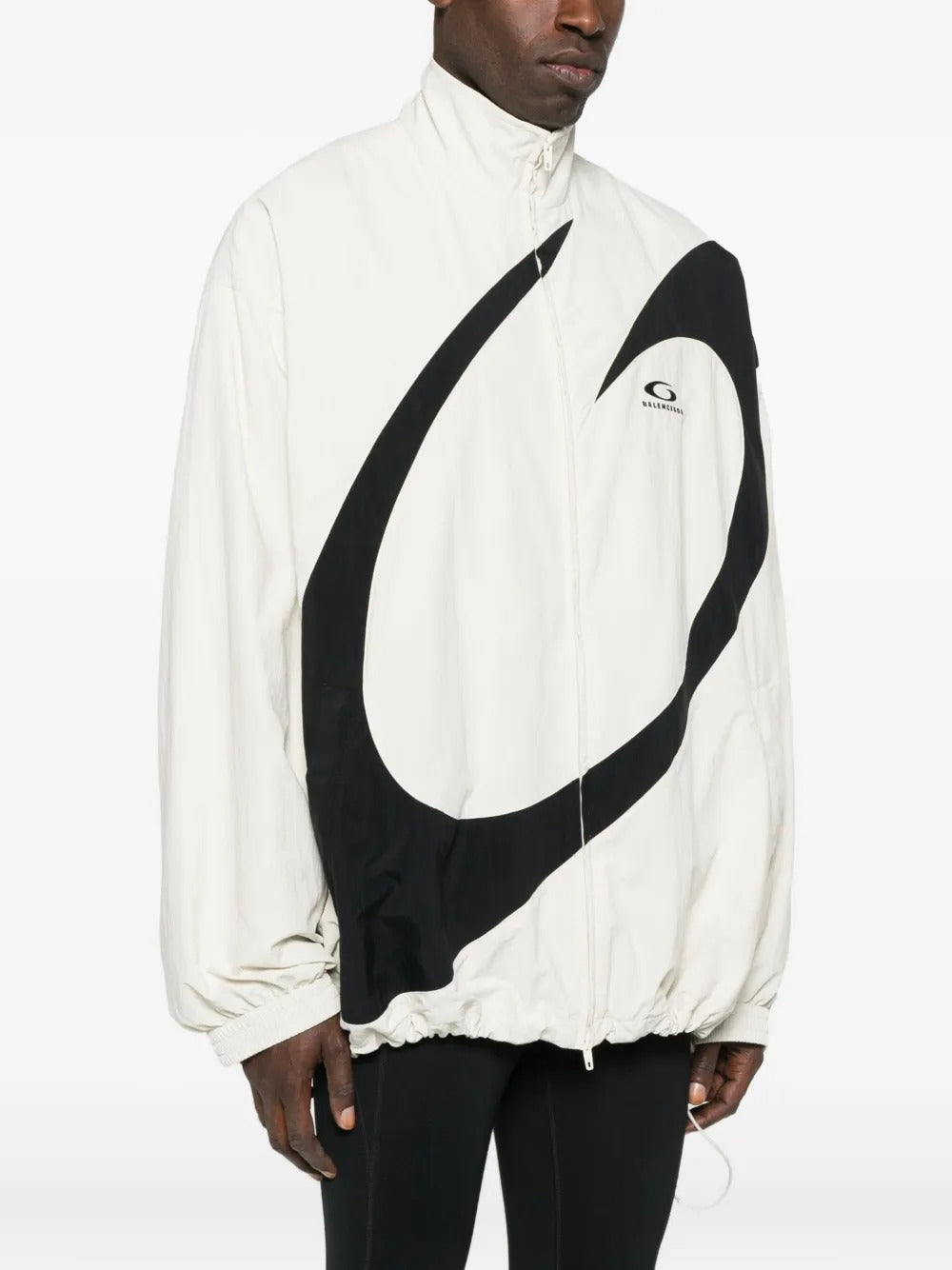 White jacket worn by a person, showing the jacket's fit