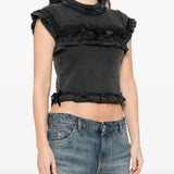 Black t-shirts worn by a person, showing the t-shirts fit