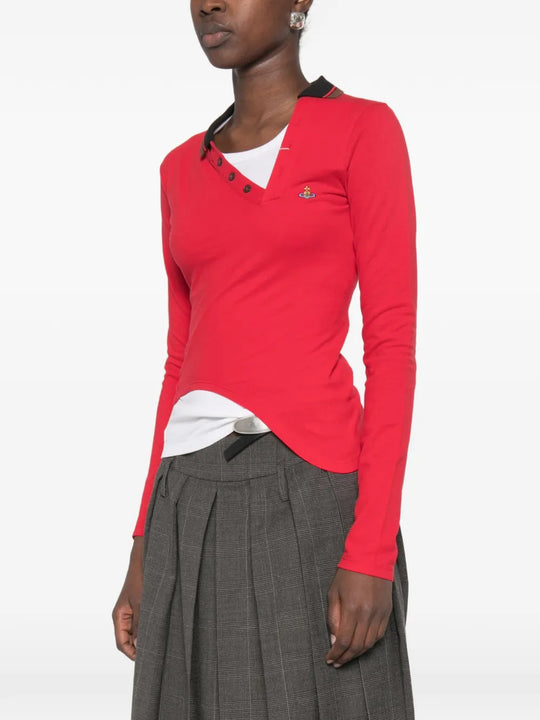 Red shirt worn by a person, showing the shirt fit