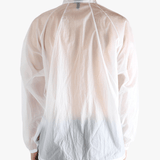 White jacket worn by a person, showing the jacket fit