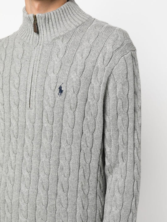 Close up of grey sweater, showing texture of the cotton fabric