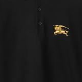 Close up of black t-shirt, showing texture of the cotton fabric
