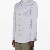 Blue shirt worn by a person, showing the shirt fit