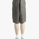 Blue pants worn by a person, showing the pants' fit