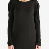 Brown top worn by a person, showing the top fit