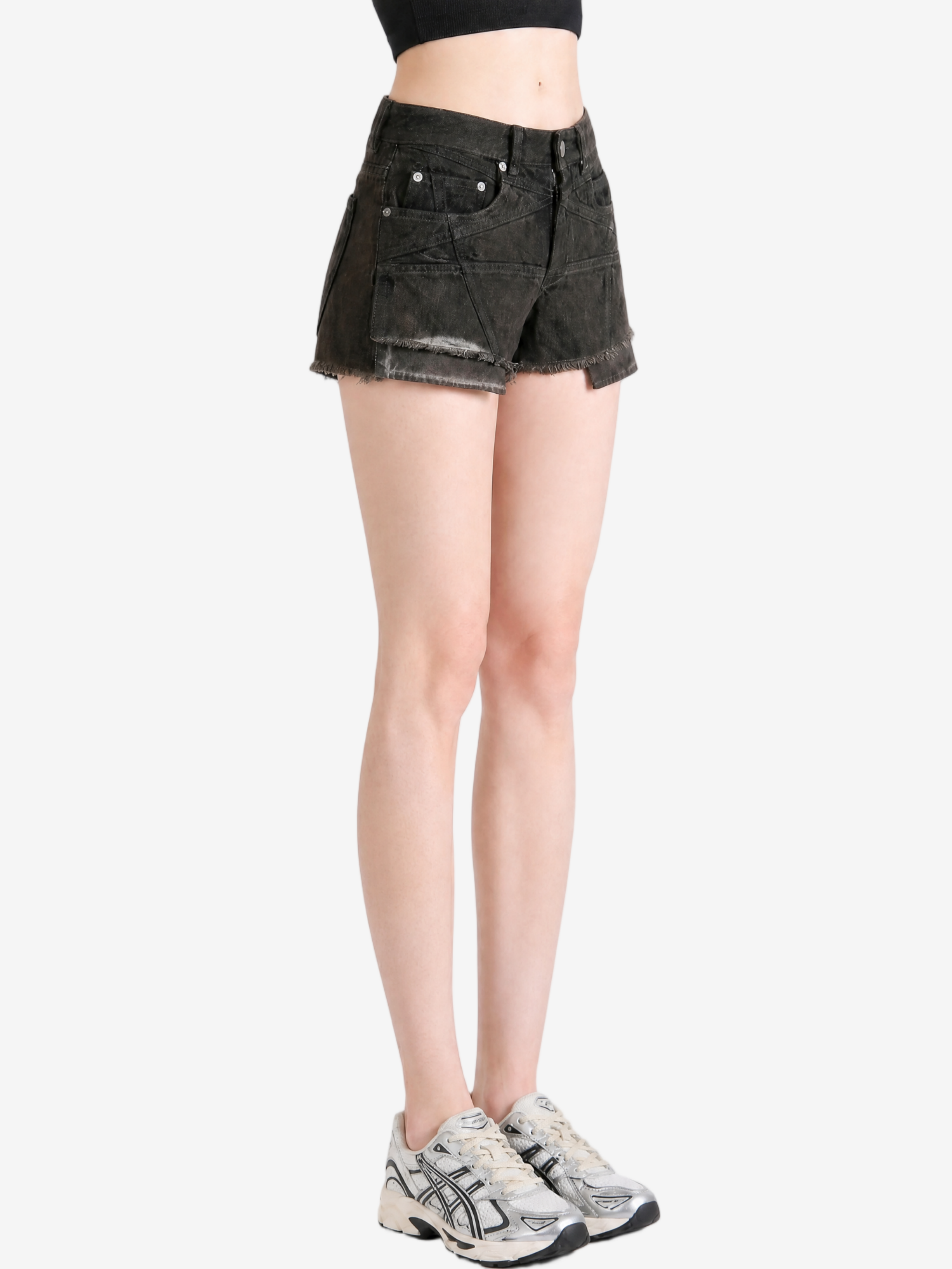 Black shorts worn by a person, showing the shorts fit