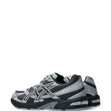 Grey sneakers, side view