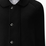 Close up of black jacket,showing texture of the cotton fabric