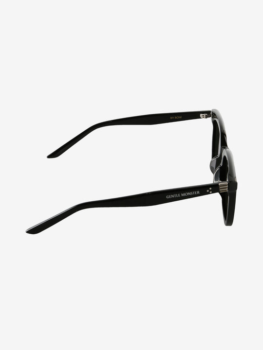 Close up of Black eyewear, showing texture of the acetate fabric