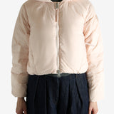 Pink jacket worn by a person, showing the jacket's fit