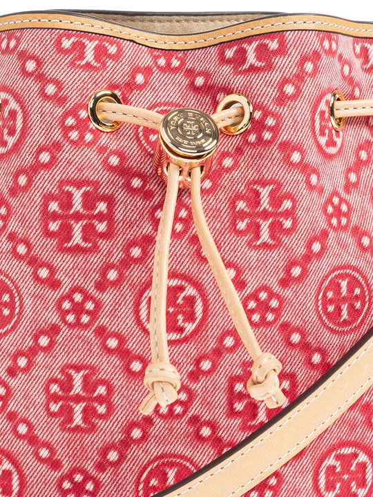 Close up of red bag, showing texture of the leather fabric