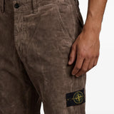 Close up of Brown pants, showing texture of the 88% cotton/ 12% polyamide fabric