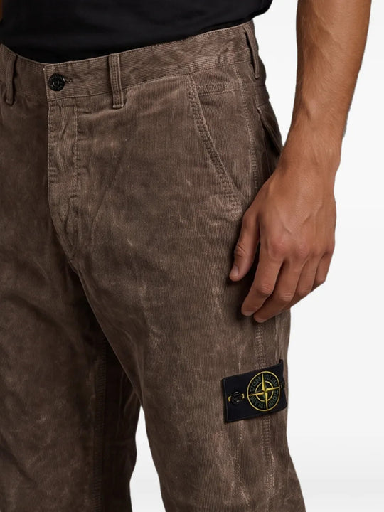 Close up of Brown pants, showing texture of the 88% cotton/ 12% polyamide fabric