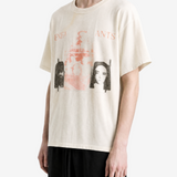 White t-shirt worn by a person, showing the t-shirt fit