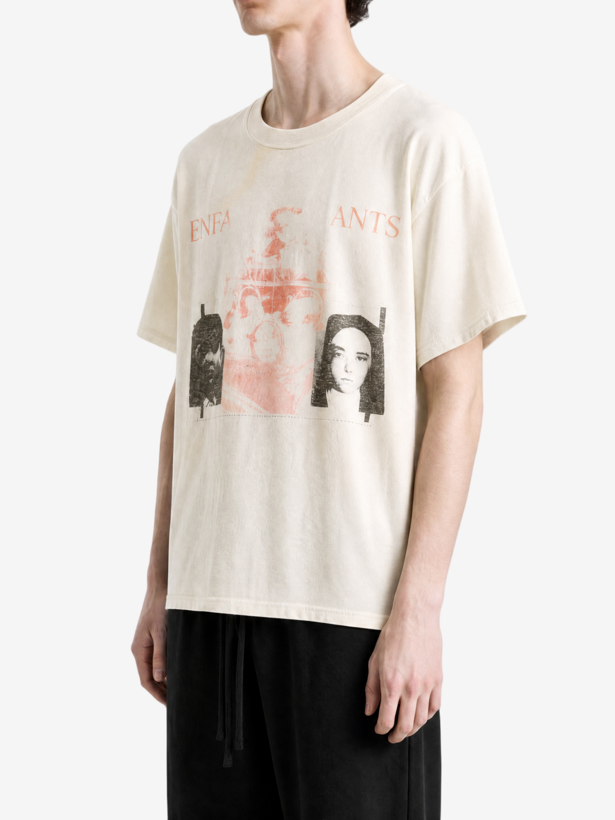 White t-shirt worn by a person, showing the t-shirt fit