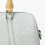 Close up of green bag, showing texture of the leather fabric