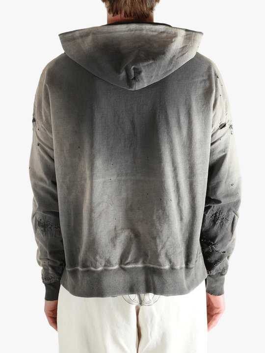 Grey sweats-hoodies worn by a person, showing the sweats-hoodies's fit